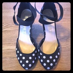 Report brand “Antonella” black polka dot size 7